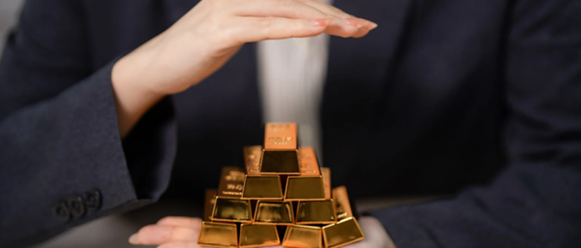 Zlate palice na dlani