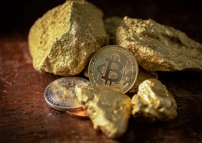 Razlike med naložbo v zlato in kriptovalute
